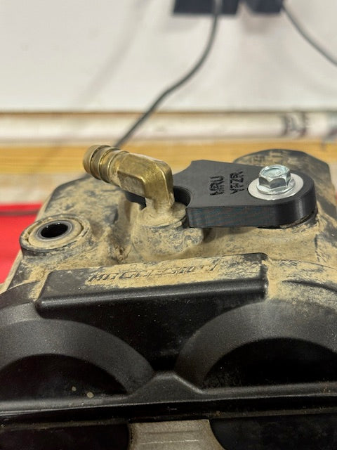 09-25 YFZR 450 Spark plug hold down